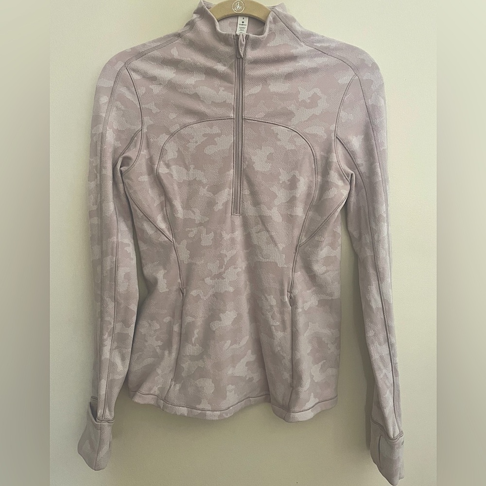 Lululemon 1/4 zip top. This is a size 8 BUT fits like a sz 6.